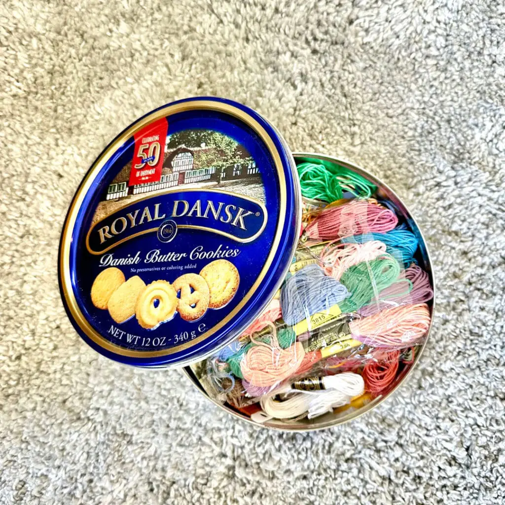 danish butter cookie tin full of embroidery floss
