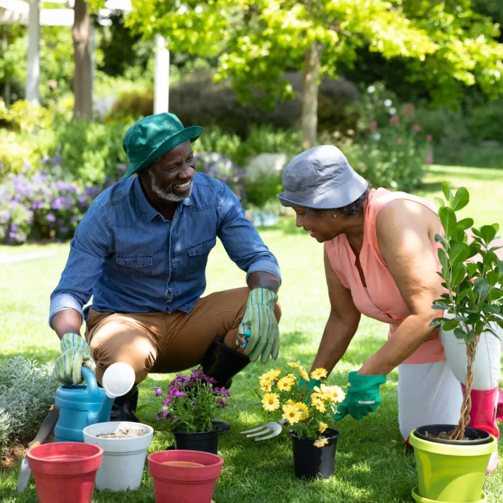 two friends gardening together