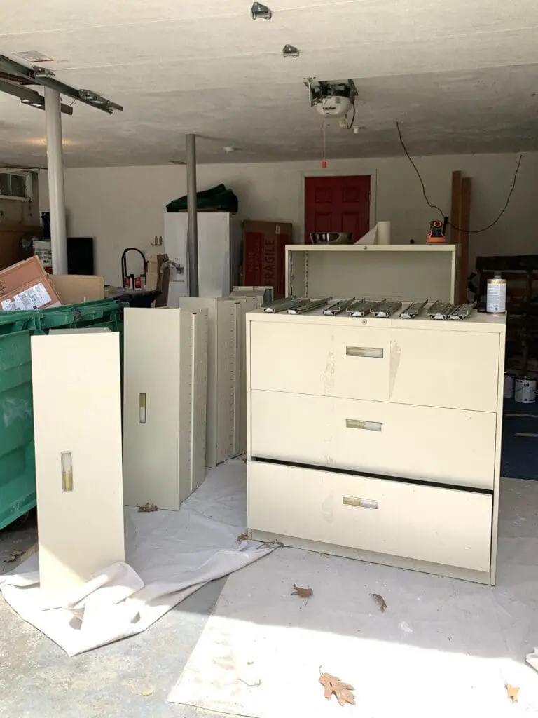 large beige office file cabinets sitting in a garage