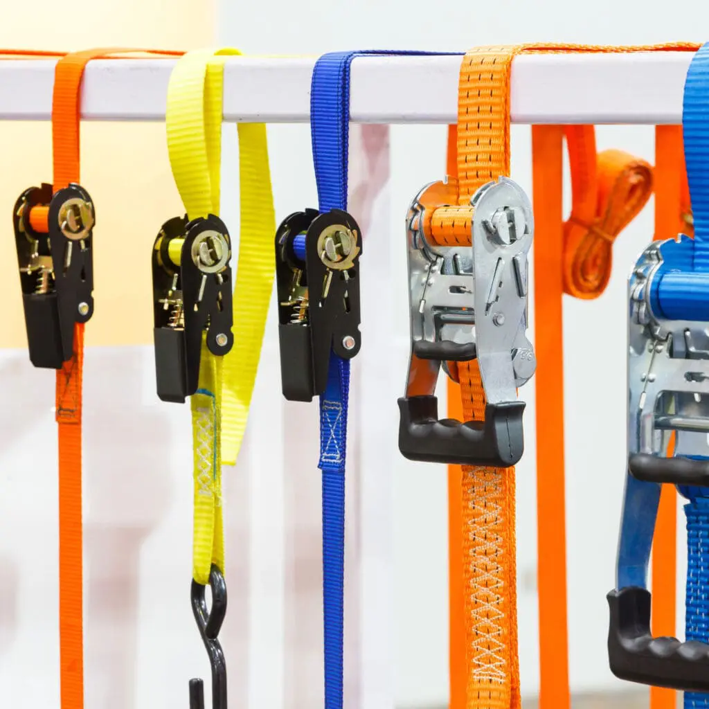 Brightly colored orange, yellow, and blue ratchet straps