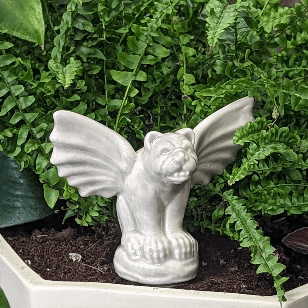 Watering stake shaped like a gargoyle